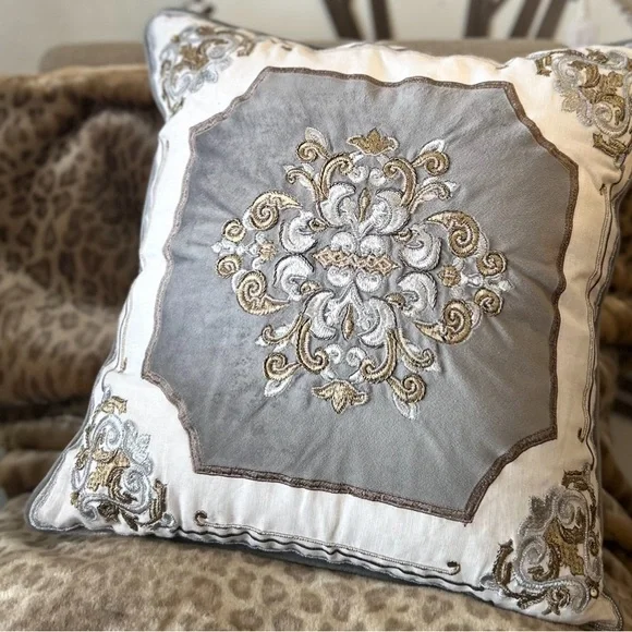 Elegant Gray, White, and Gold Crest Pillow with Form - Picture 1 of 4